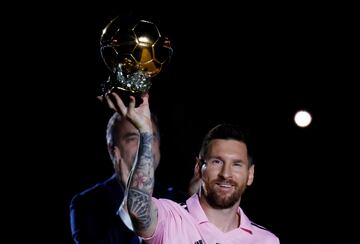 Lionel Messi poses with his eighth Ballon d'Or during the Noche d'Or ceremony.